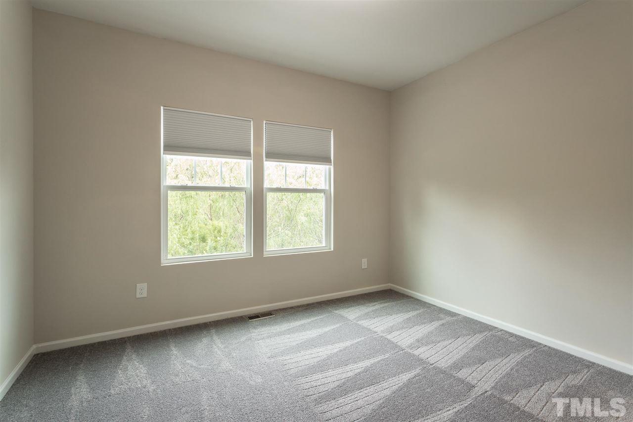 835 Davidson Point Road Cary, NC 27513 - Photo 27 of 30 an empty room with a window