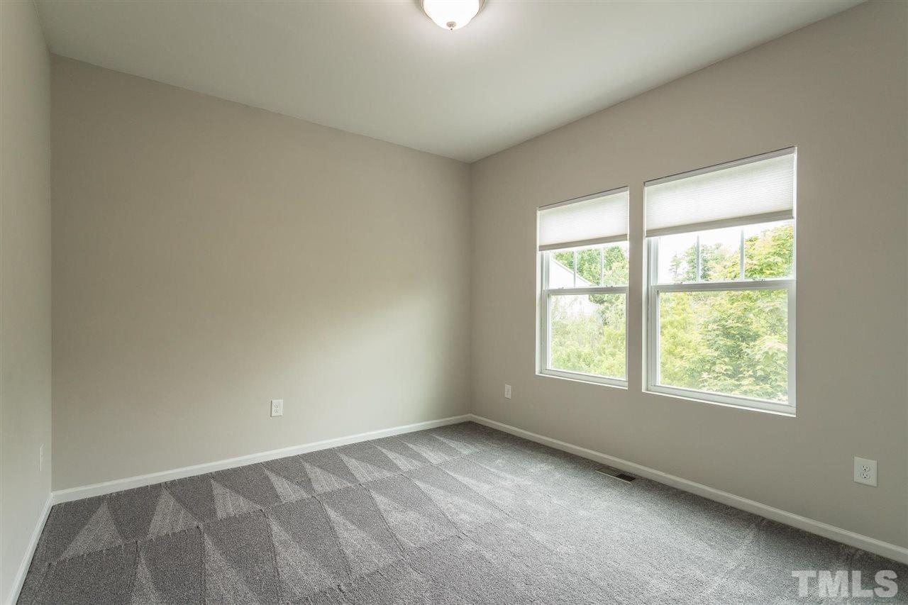835 Davidson Point Road Cary, NC 27513 - Photo 28 of 30 an empty room with a window