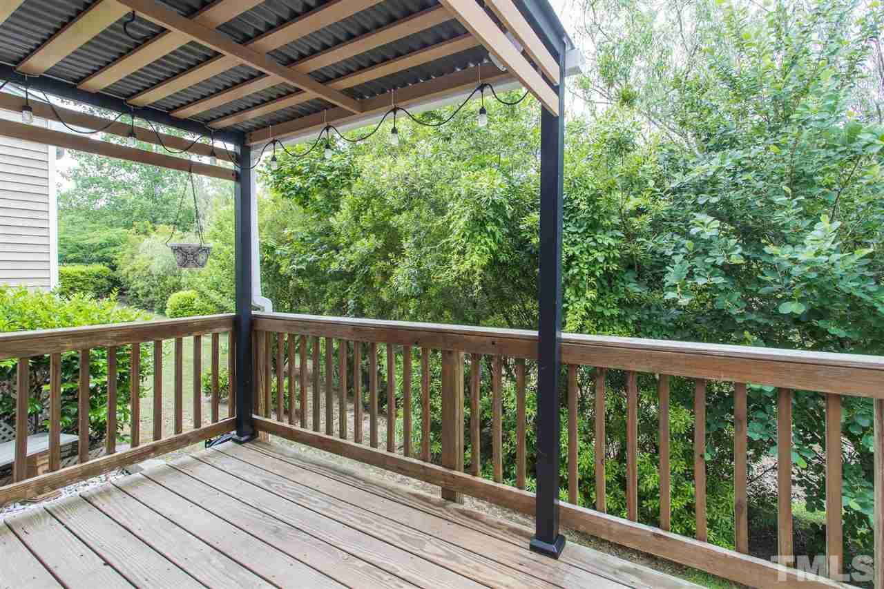 835 Davidson Point Road Cary, NC 27513 - Photo 8 of 30 a view of balcony with wooden floor