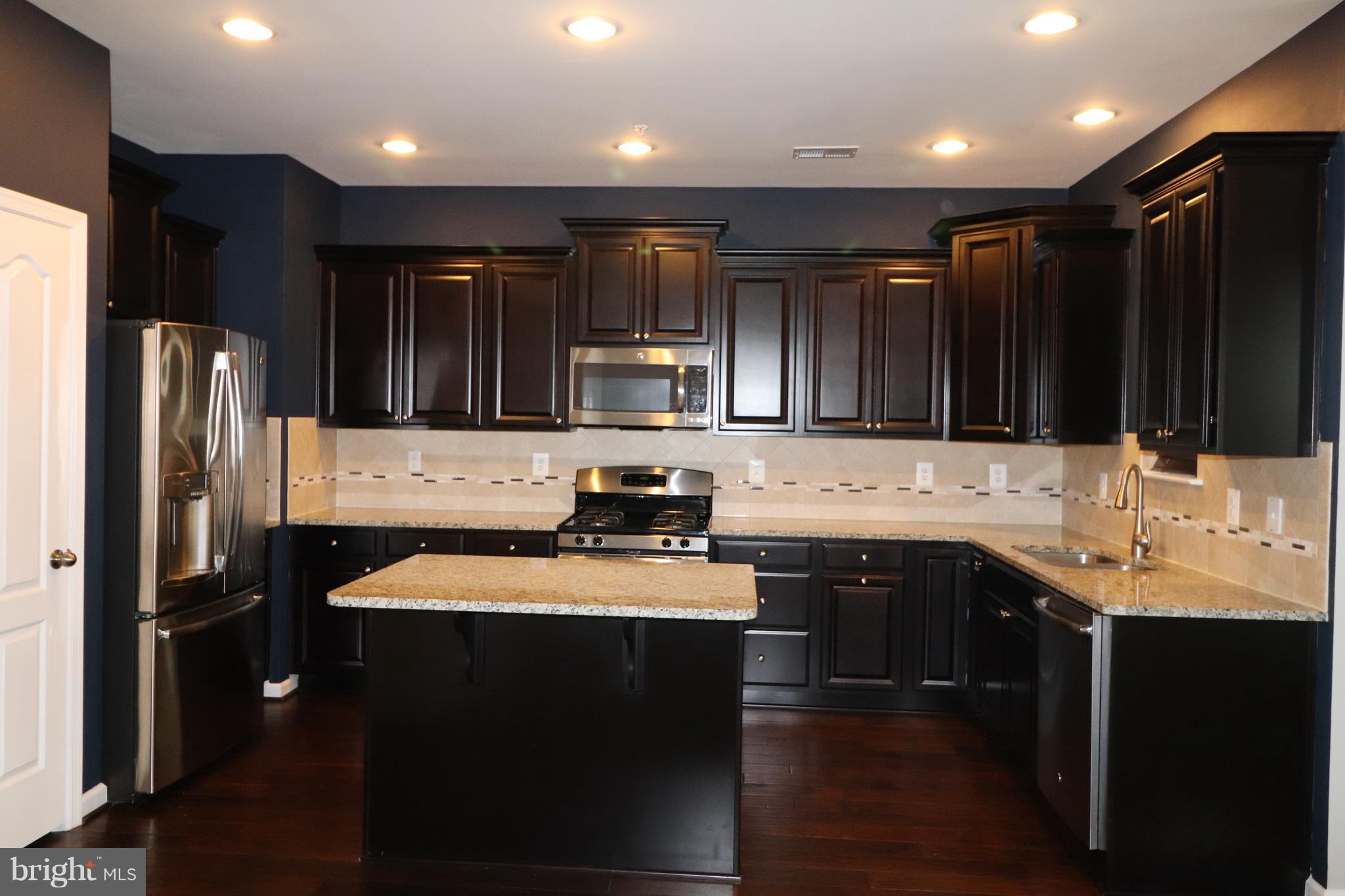 1011 Red Clover Road Gambrills, MD 21054 - Photo 6 of 28 Upgraded Kitchen, Island, Granite, Stainless Appl.