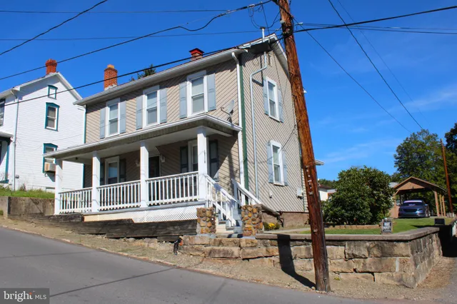 a front view of a house with a garage