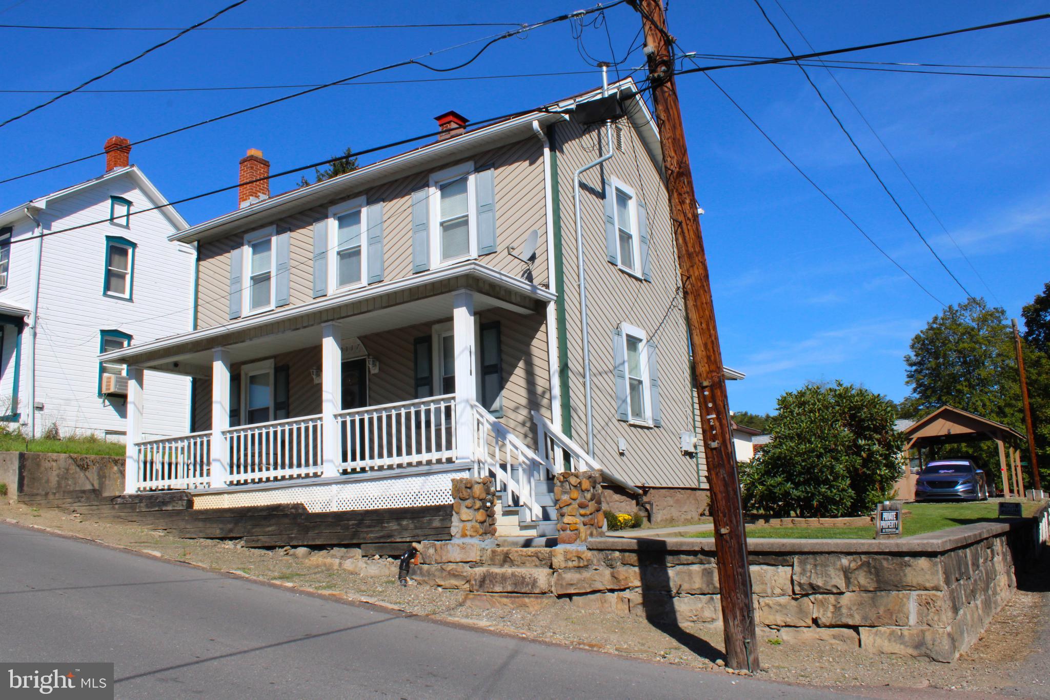 10117 Hummingbird Street Ellerslie, MD 21529 - Photo 4 of 76 a front view of a house with a garage