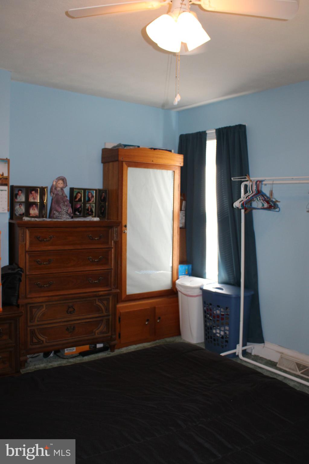 10117 Hummingbird Street Ellerslie, MD 21529 - Photo 60 of 76 a view of room with window and hardwood floor