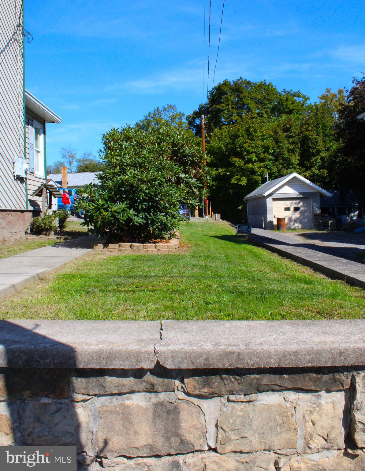 10117 Hummingbird Street Ellerslie, MD 21529 - Photo 7 of 76 a house view with a garden space