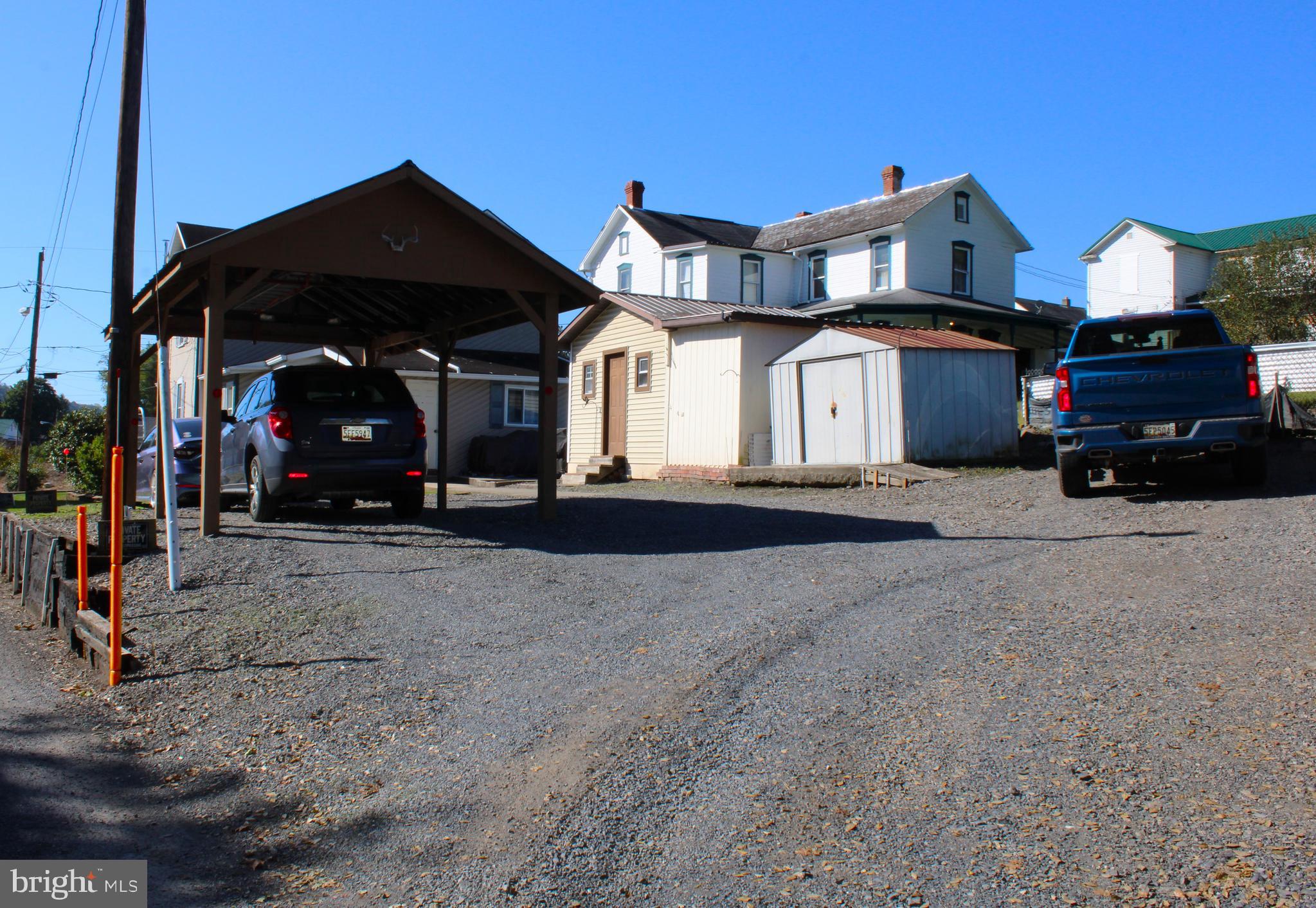 10117 Hummingbird Street Ellerslie, MD 21529 - Photo 10 of 76 a car parked in front of a house