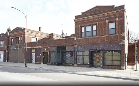 a parked car parked in front of a building