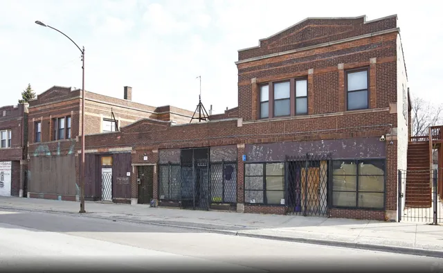 a parked car parked in front of a building