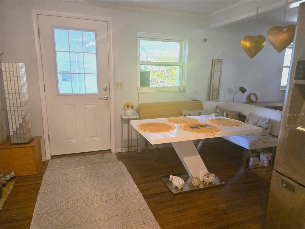 2455 Royal Road DeLand, FL 32724 - Photo 6 of 18 a view of a room that has a table and chairs
