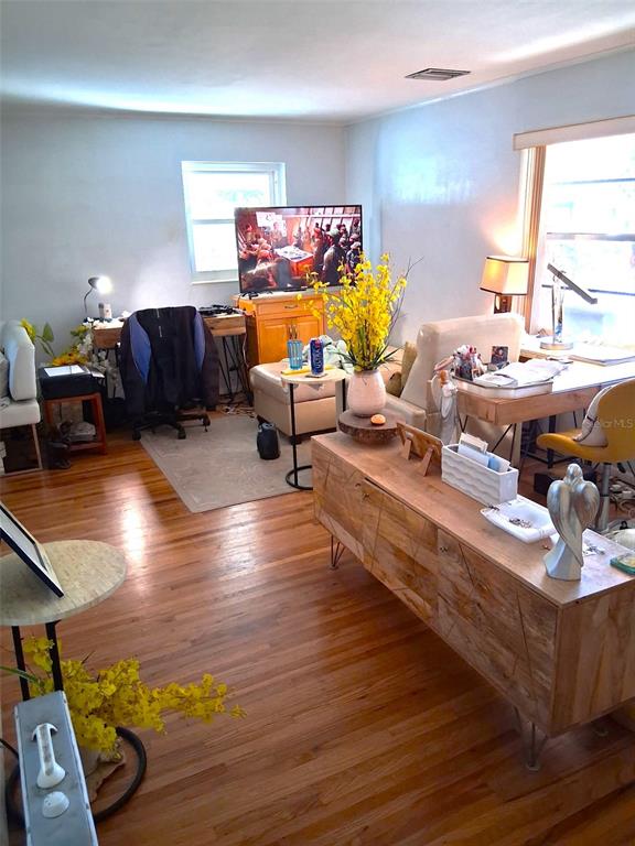 2455 Royal Road DeLand, FL 32724 - Photo 7 of 18 a living room with furniture and a flat screen tv