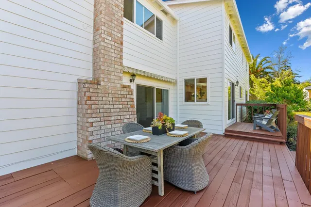 a view of house with patio outdoor seating