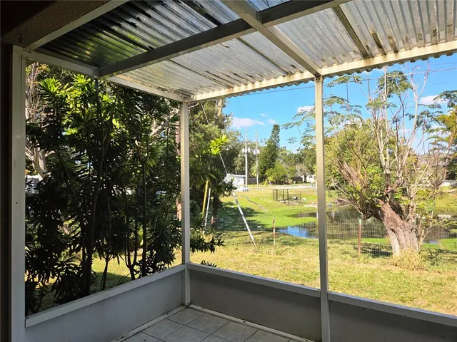 a view of swimming pool from a window