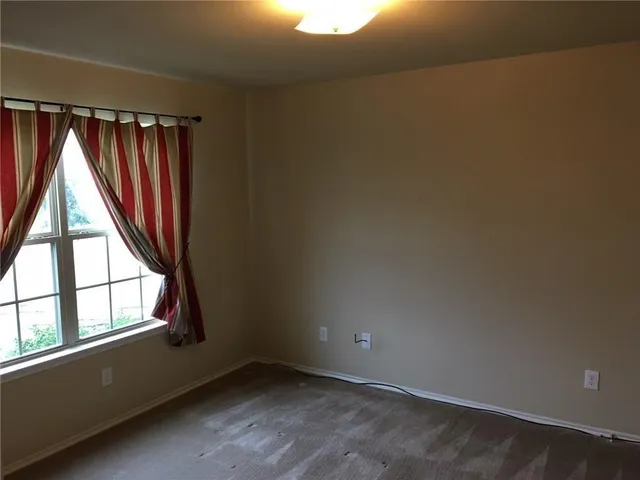 a house view with garden space