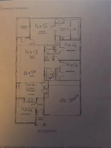 a dining room with furniture and a chandelier