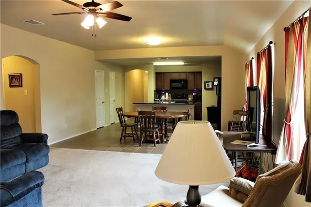 a view of a dining room with furniture