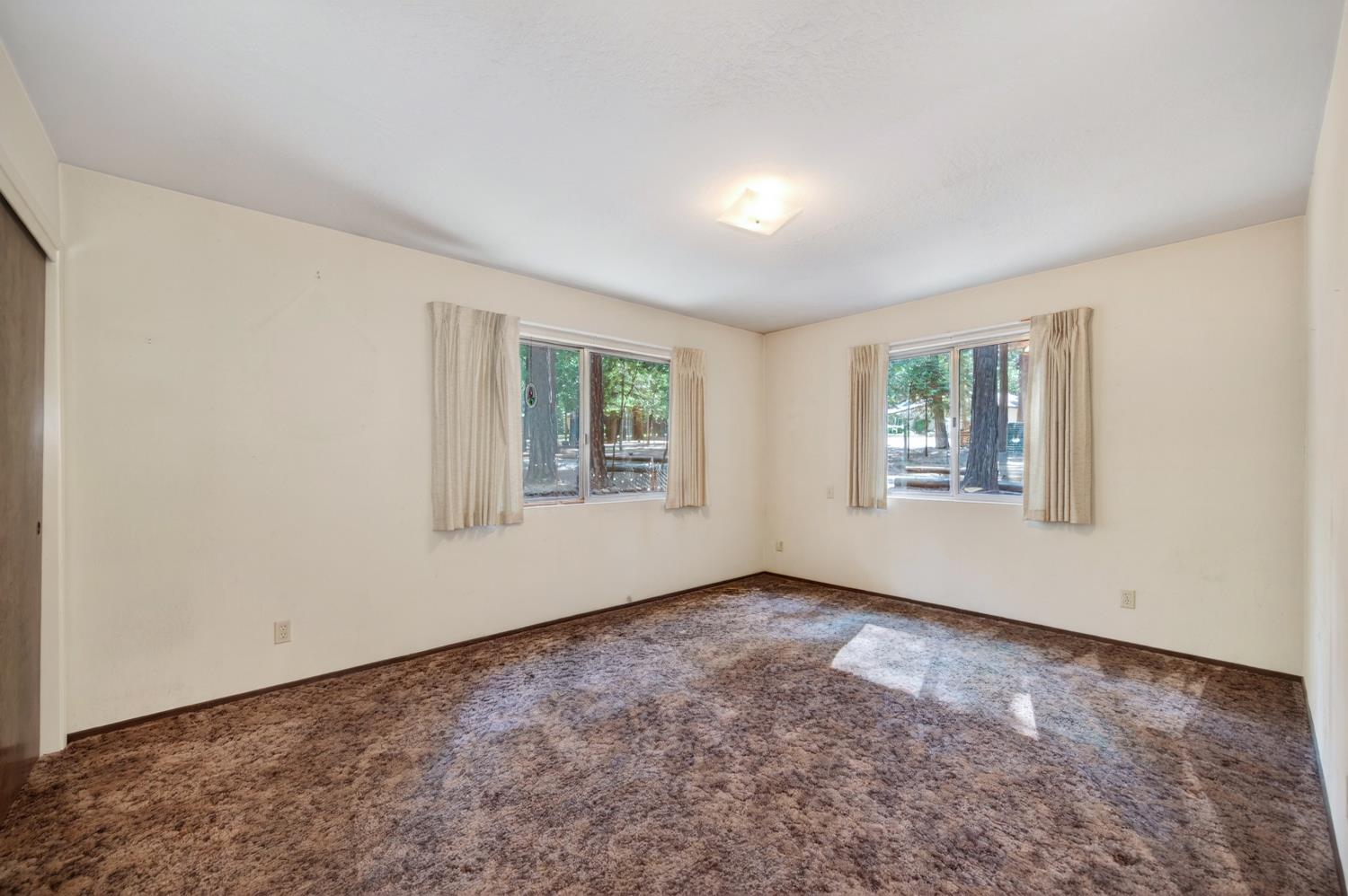 20191 Kit Court Volcano, CA 95689 - Photo 31 of 54 an empty room with windows