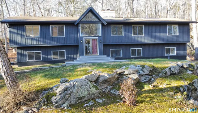 a view of a house with swimming pool