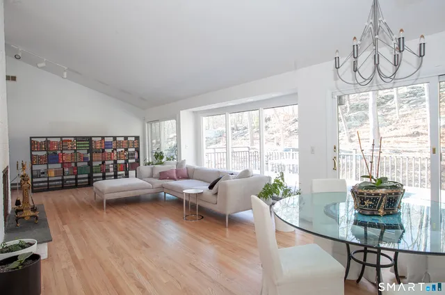 a bedroom with a bed a desk and chair