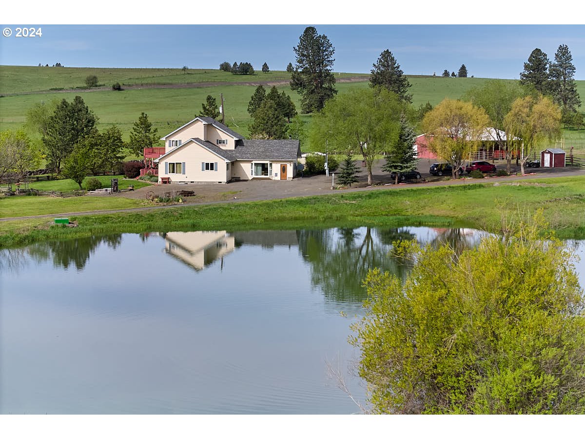 76012 Highway 82 Elgin, OR 97827 - Photo 1 of 41 a view of swimming pool and lake view