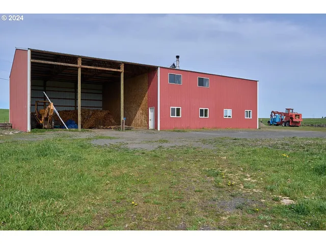 a view of front door with yard
