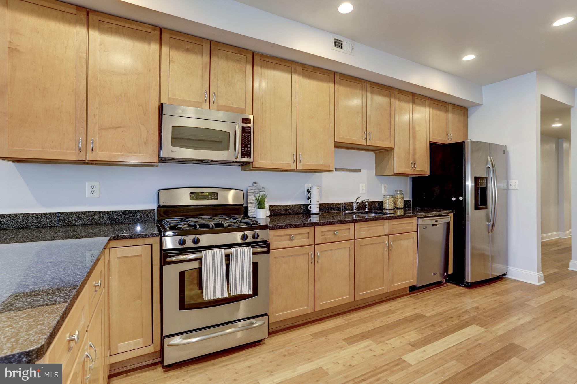 2713 Ontario Road Northwest, Unit 3 Washington, DC 20009 - Photo 4 of 21 Granite counters and stainless appliances