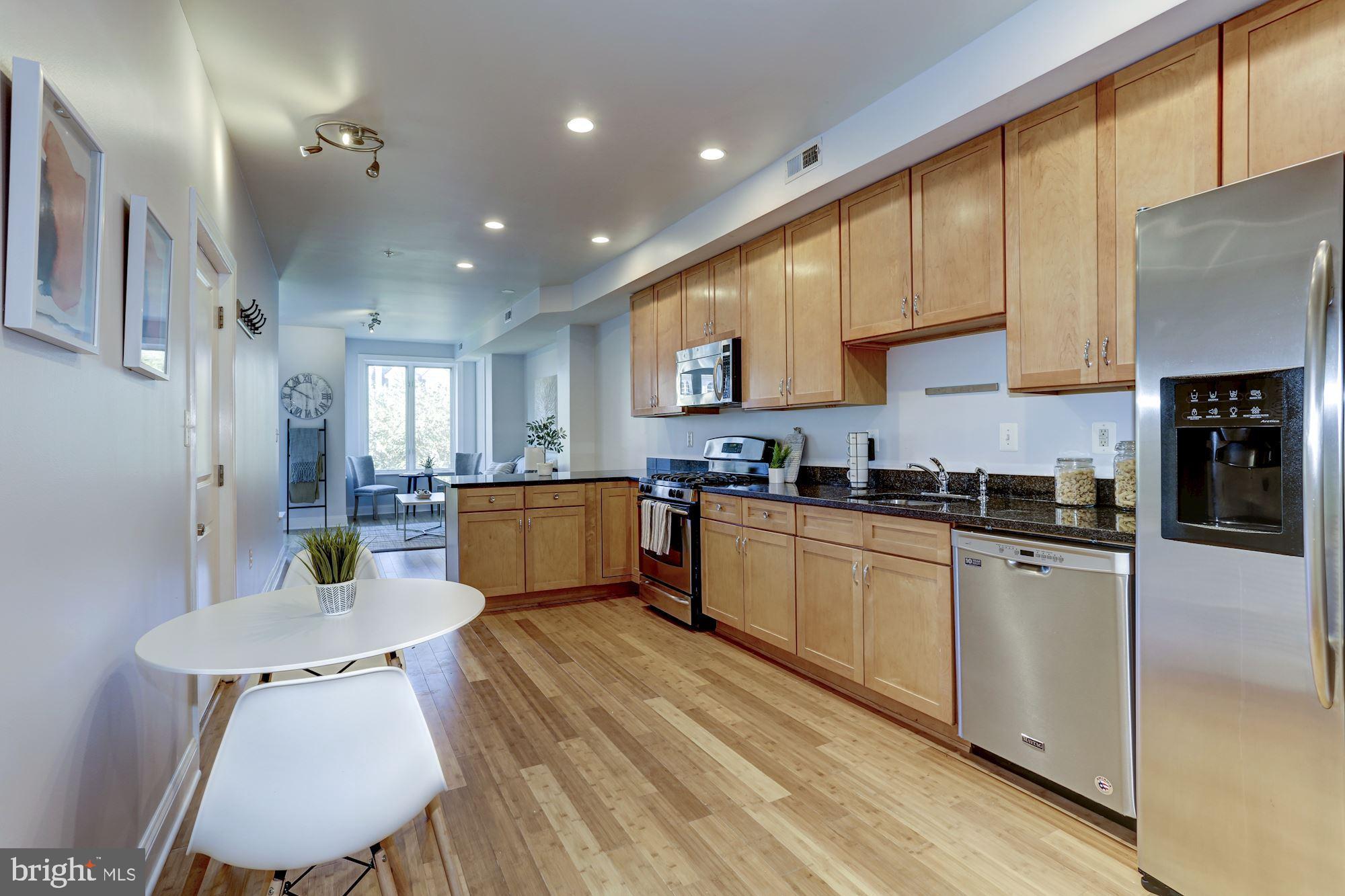 2713 Ontario Road Northwest, Unit 3 Washington, DC 20009 - Photo 5 of 21 Open kitchen to living room