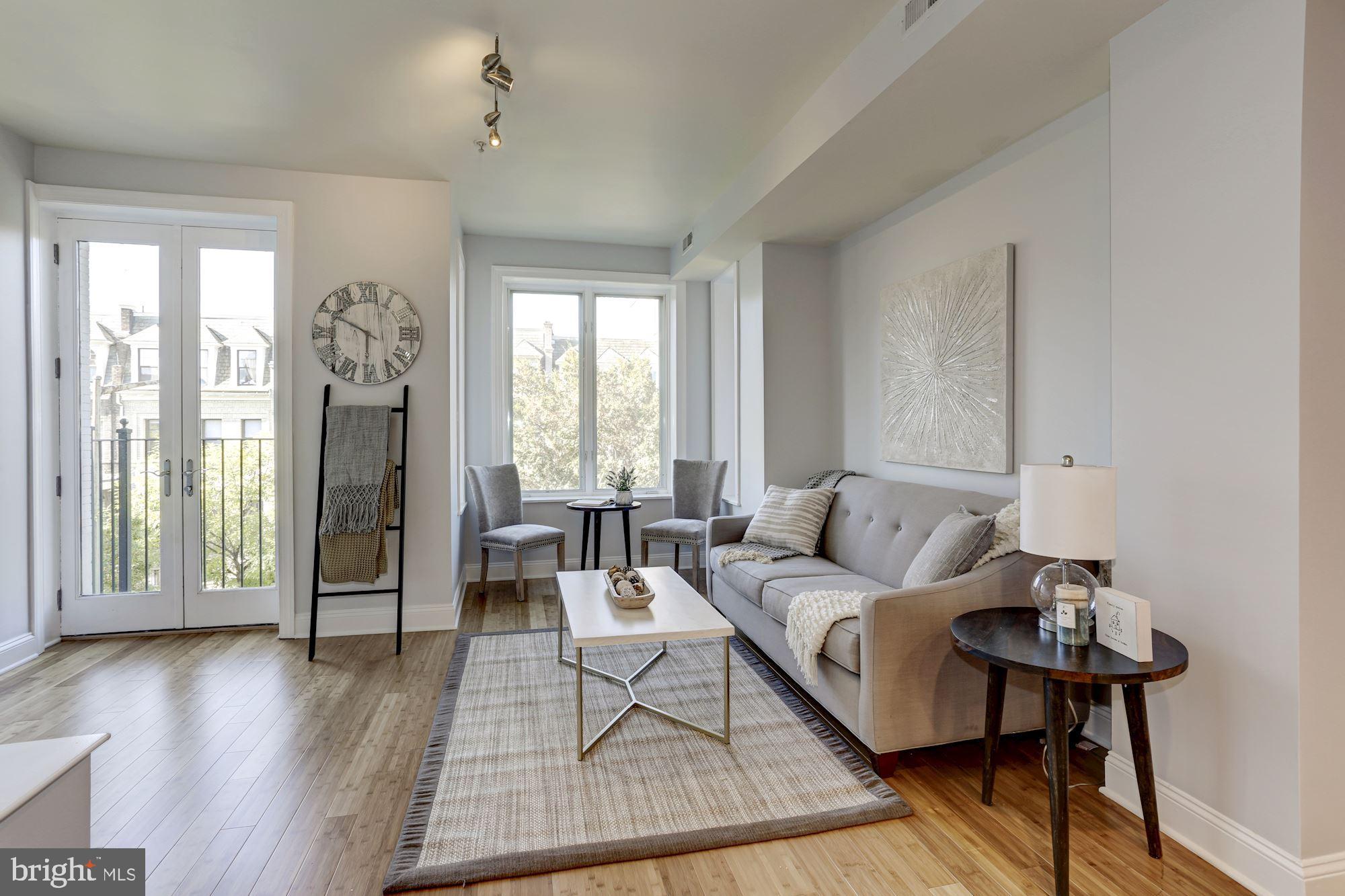 2713 Ontario Road Northwest, Unit 3 Washington, DC 20009 - Photo 6 of 21 Spacious living area with loads of light