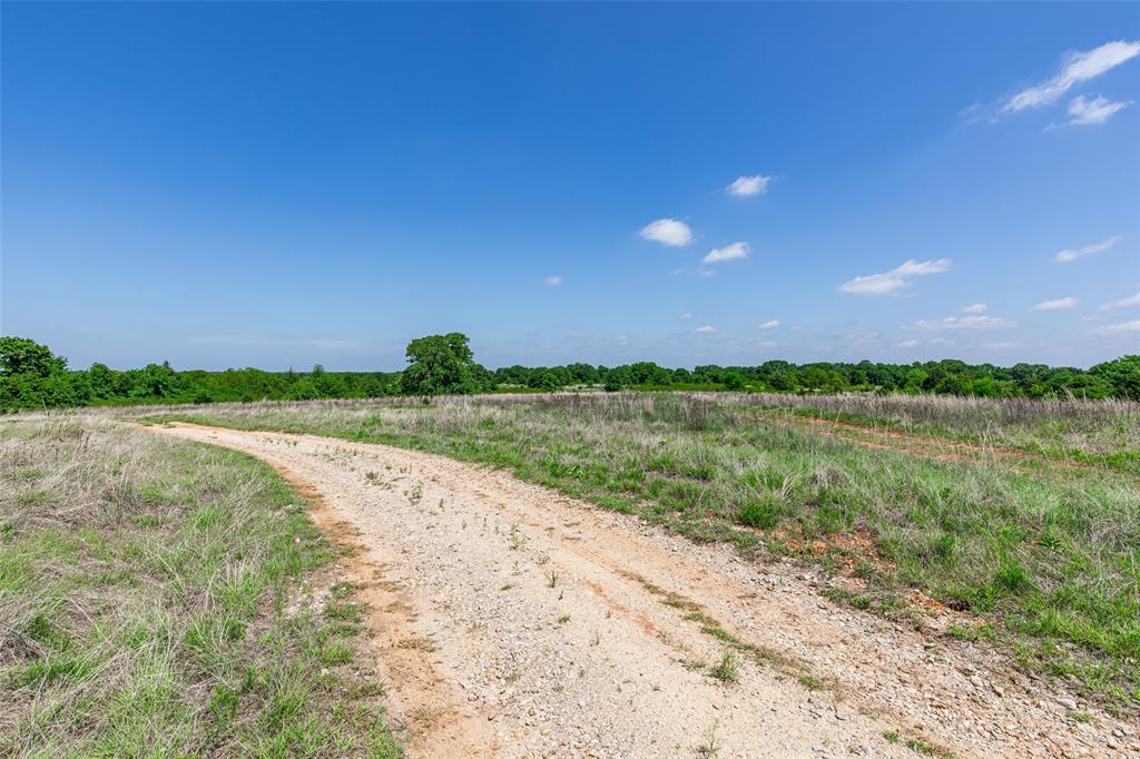 2043 Huddleston Road Sunset, TX 76270 - Photo 27 of 36 a view of a lake from a yard