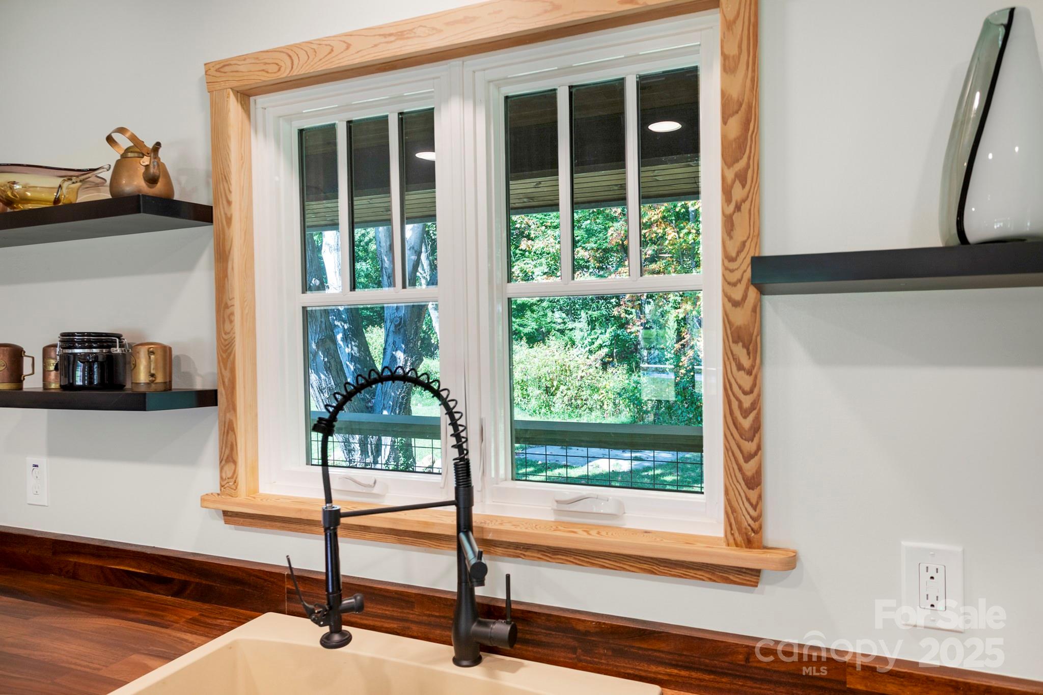 1808 Allens Creek Road Waynesville, NC 28786 - Photo 15 of 45 a view of a livingroom with furniture and a window