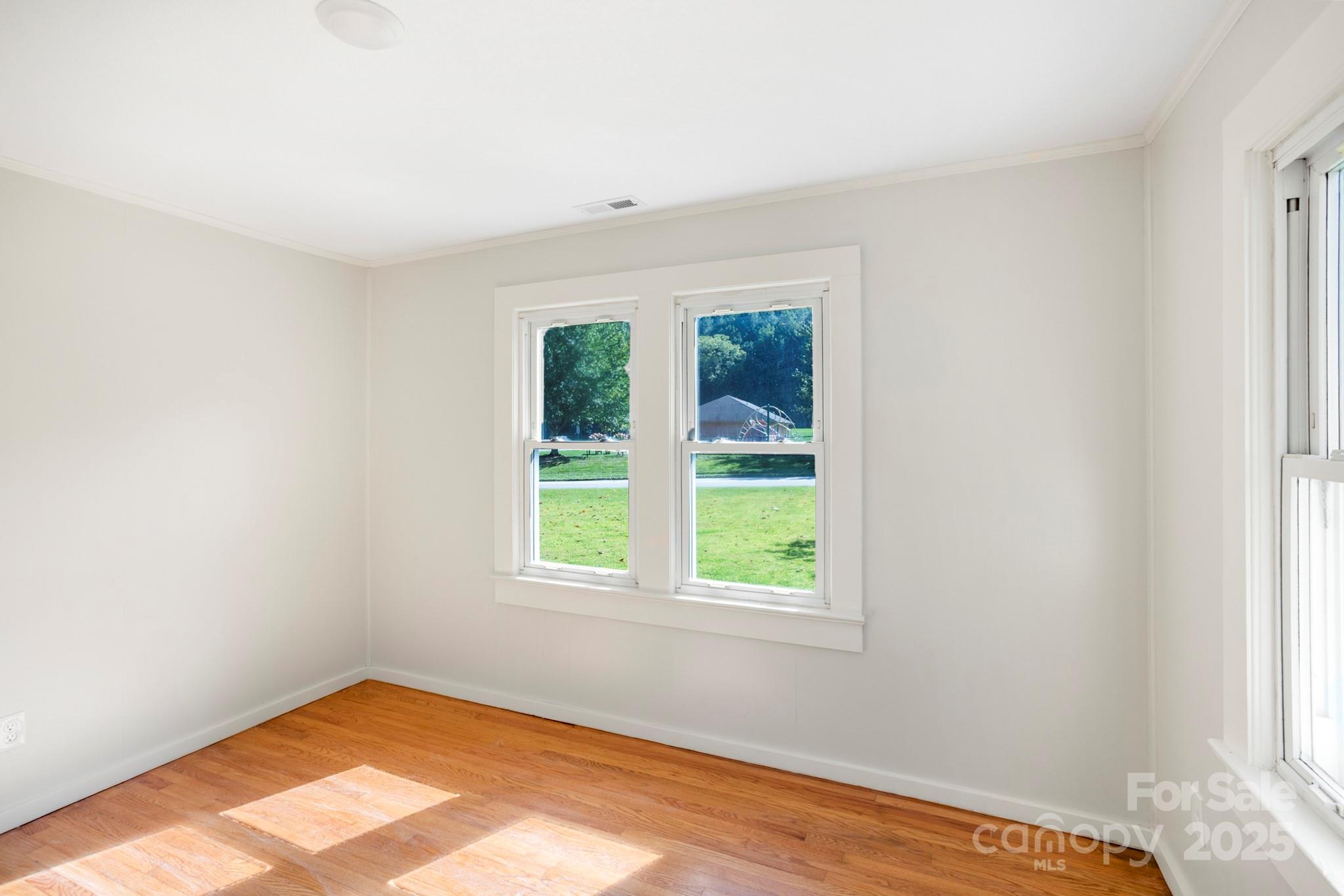 1808 Allens Creek Road Waynesville, NC 28786 - Photo 17 of 45 an empty room with a window