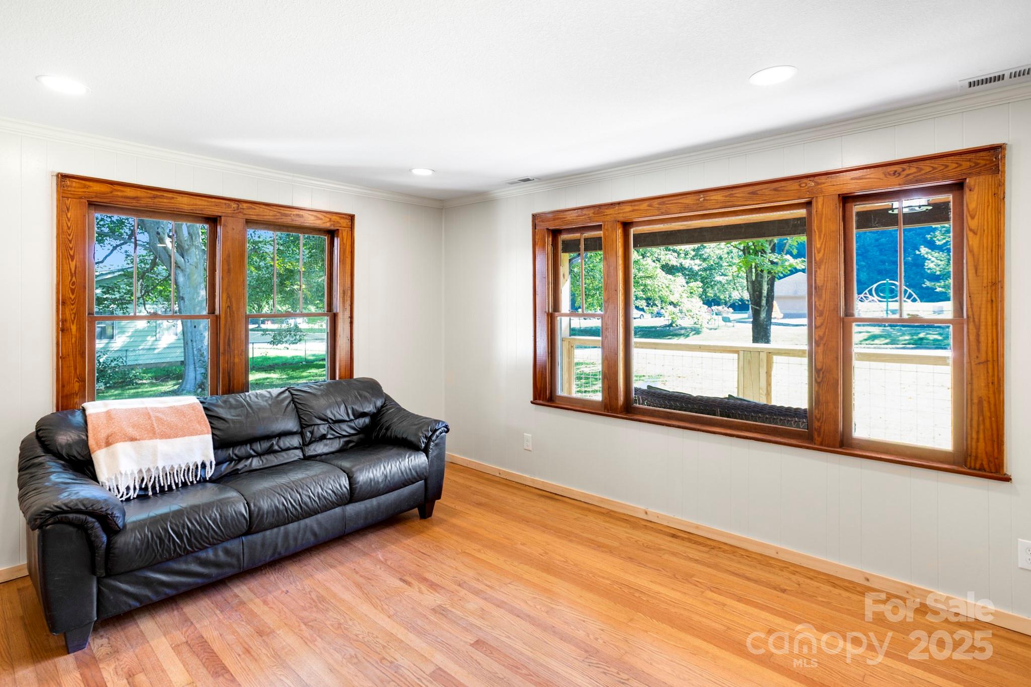 1808 Allens Creek Road Waynesville, NC 28786 - Photo 35 of 45 a living room with furniture and a large window