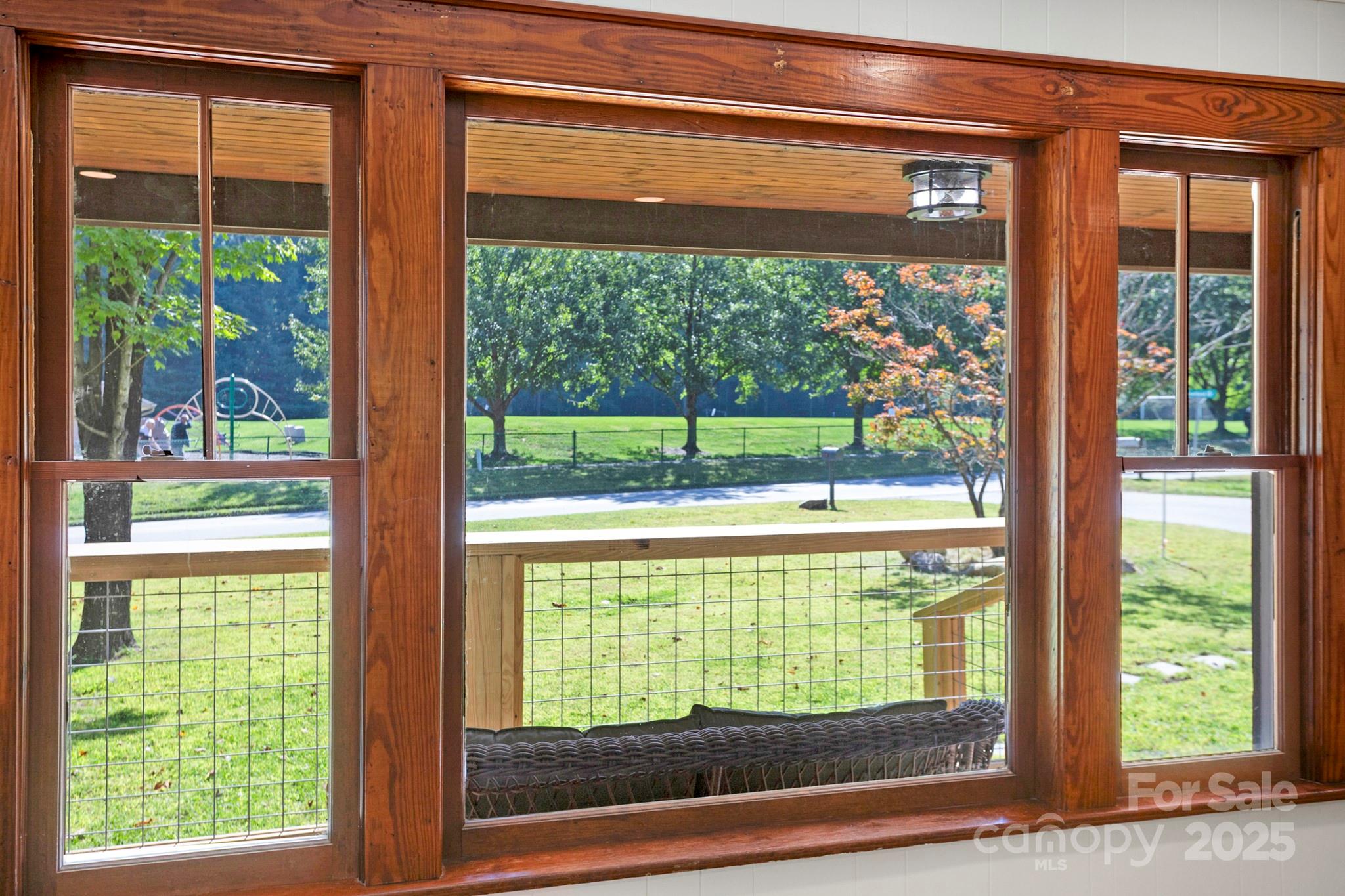 1808 Allens Creek Road Waynesville, NC 28786 - Photo 36 of 45 a view of a glass door with a yard from a room