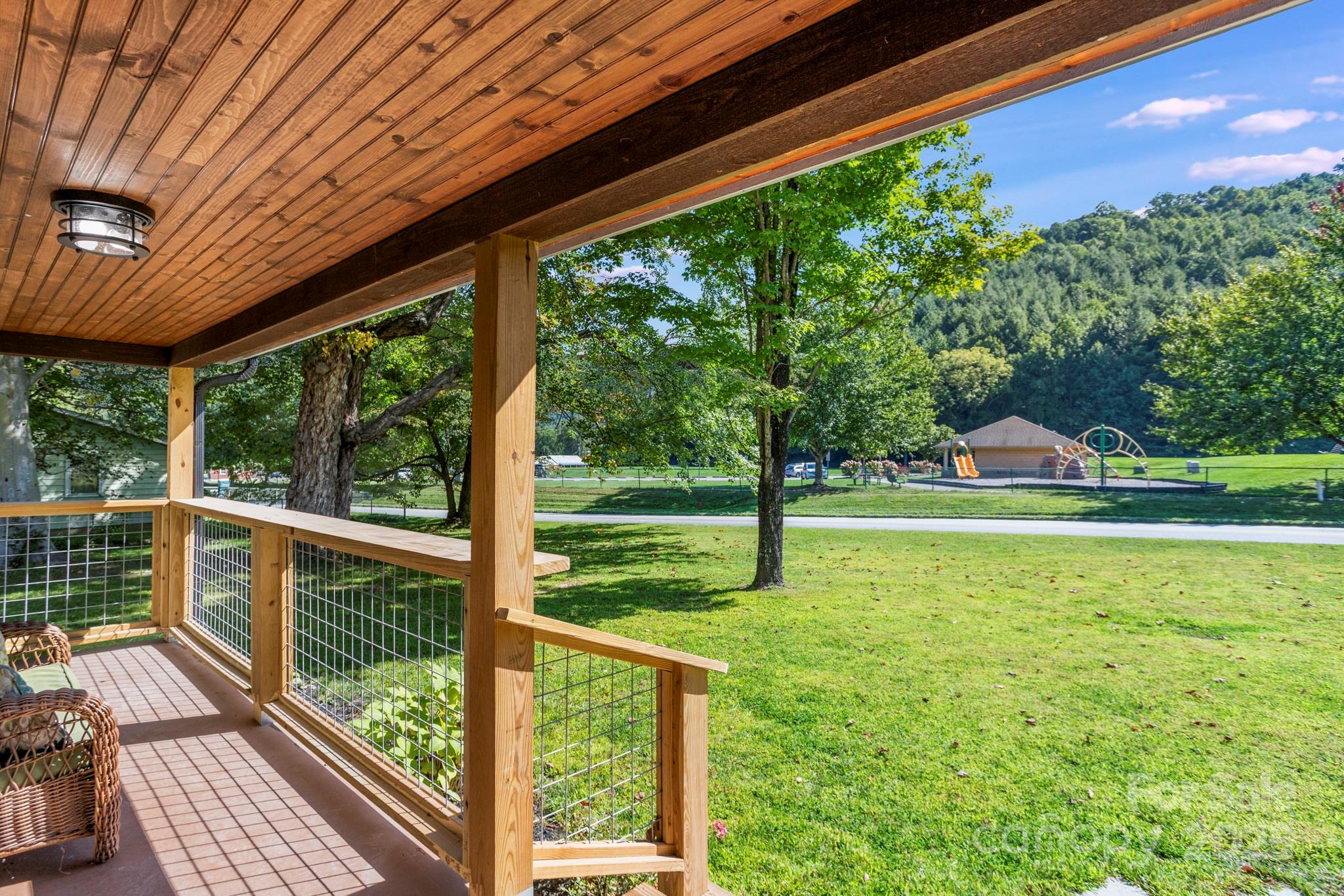1808 Allens Creek Road Waynesville, NC 28786 - Photo 42 of 45 a view of swimming pool from a balcony