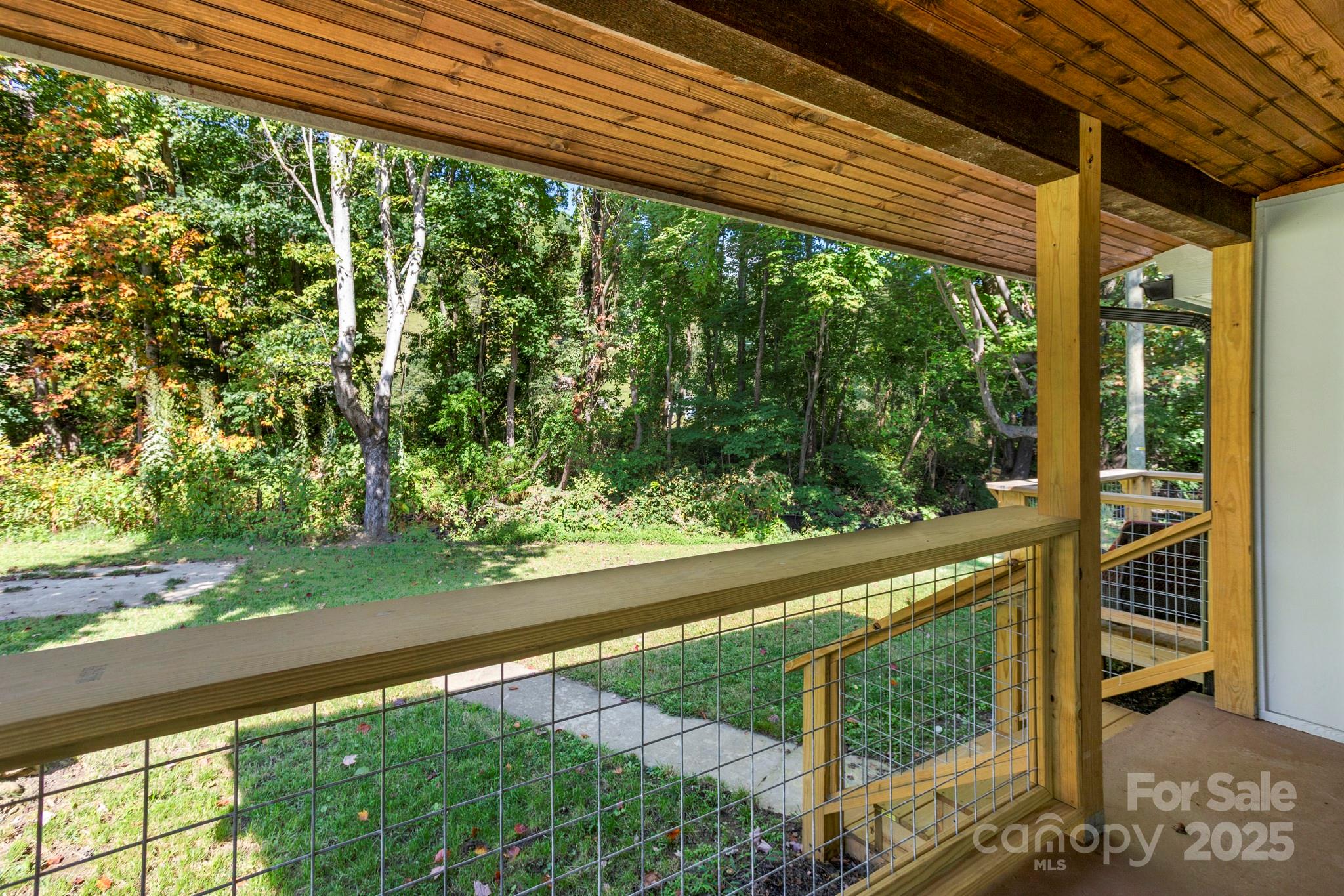 1808 Allens Creek Road Waynesville, NC 28786 - Photo 8 of 45 a view of a garden from a window