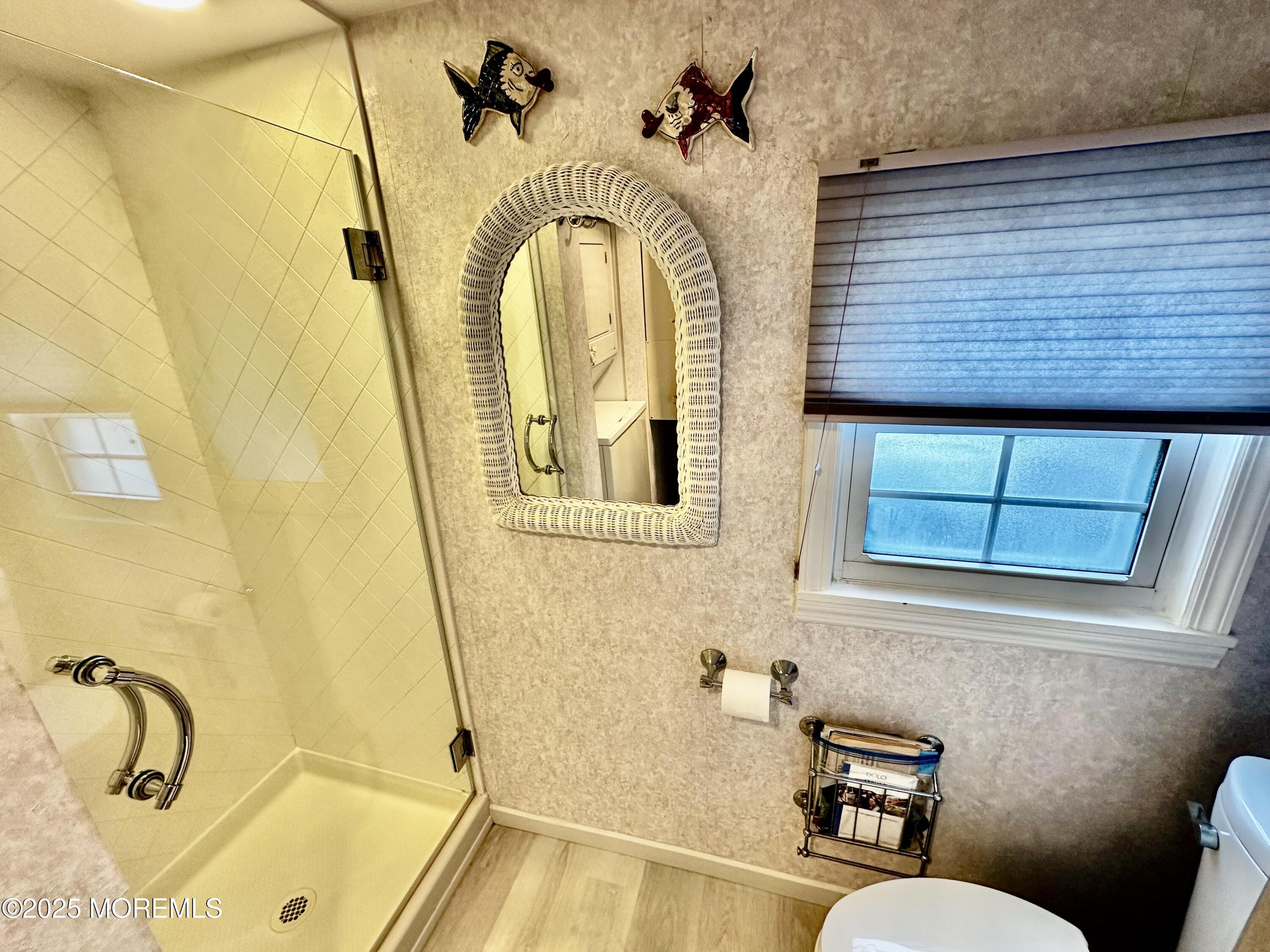 37 East Flamingo Way Lavallette, NJ 08735 - Photo 12 of 17 a bathroom with a granite countertop sink and a mirror