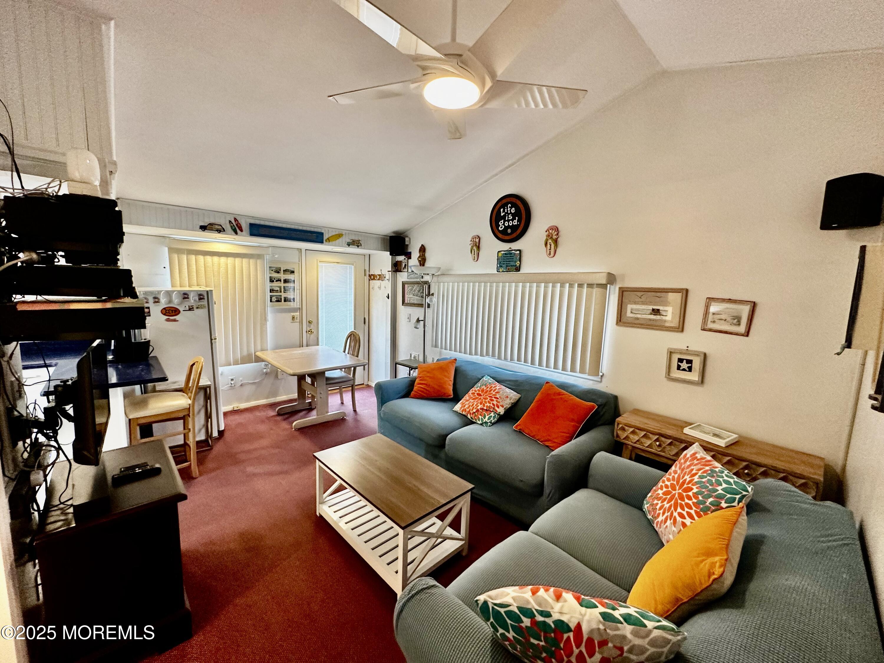 37 East Flamingo Way Lavallette, NJ 08735 - Photo 5 of 17 a living room with furniture and a rug