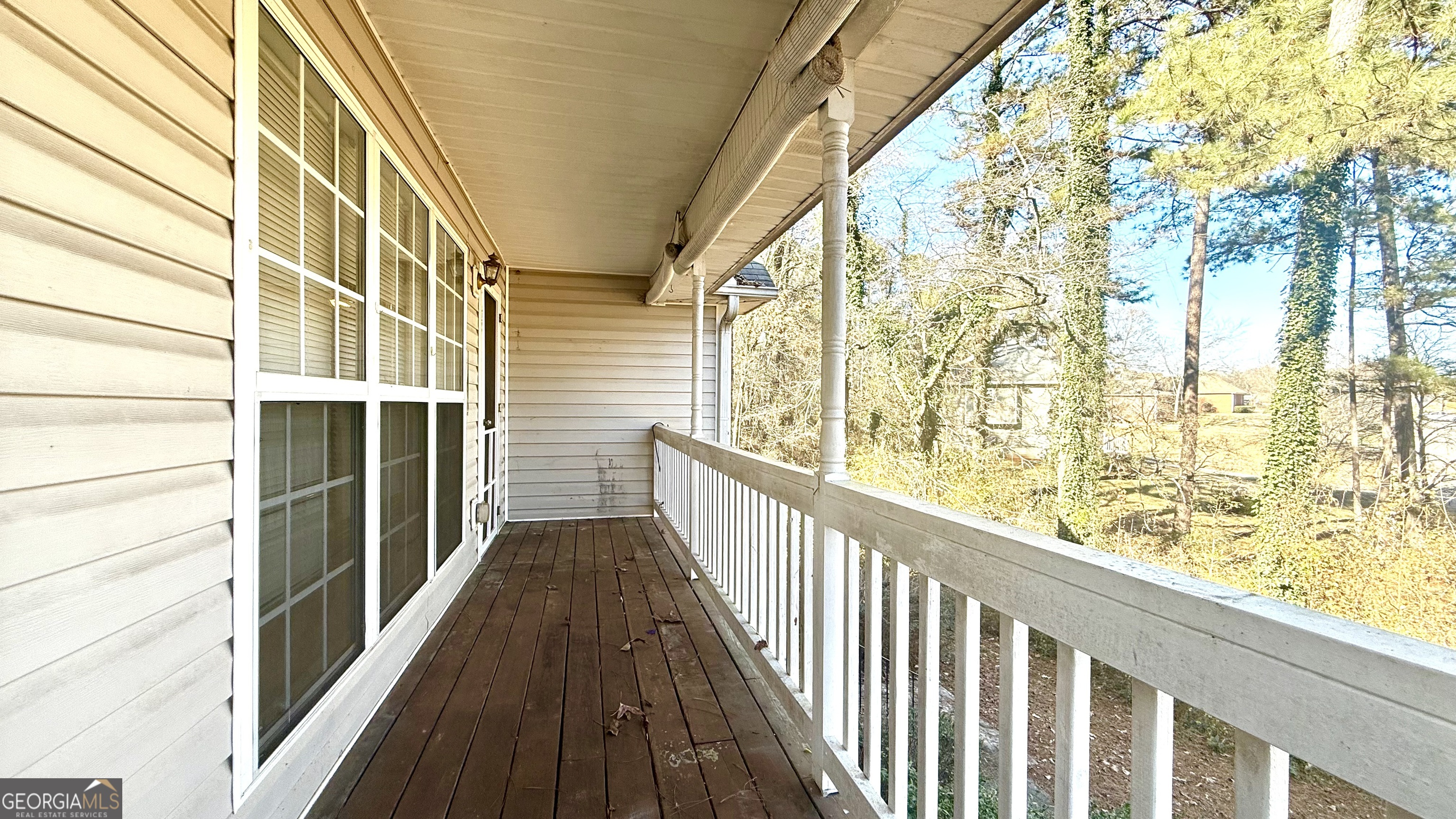 230 Mels Way Stockbridge, GA 30281 - Photo 14 of 40 a view of balcony with wooden floor