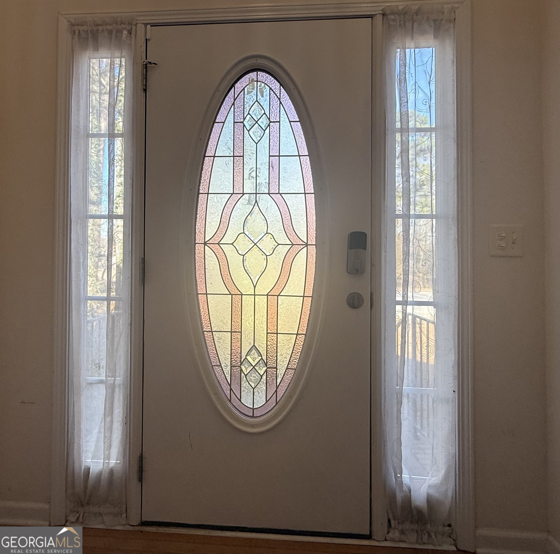 230 Mels Way Stockbridge, GA 30281 - Photo 23 of 40 a view of front door with hallway