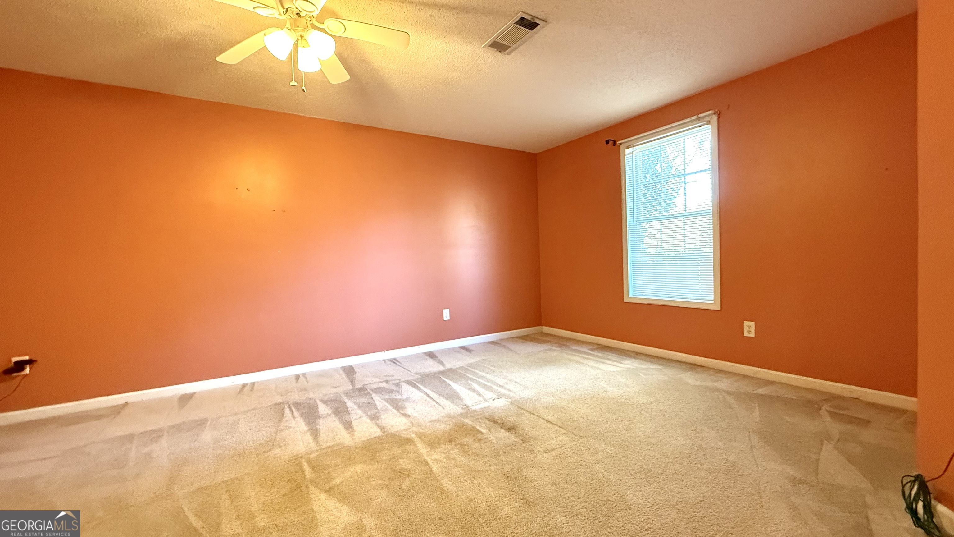 230 Mels Way Stockbridge, GA 30281 - Photo 25 of 40 a view of an empty room with a window