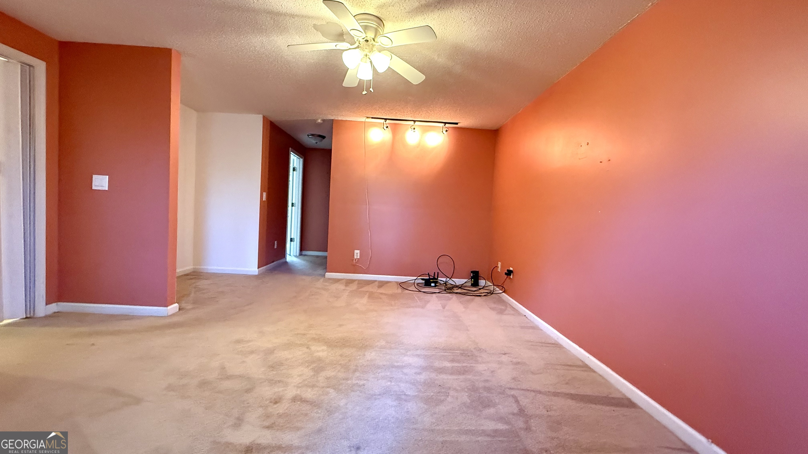 230 Mels Way Stockbridge, GA 30281 - Photo 27 of 40 an empty room with windows and fan