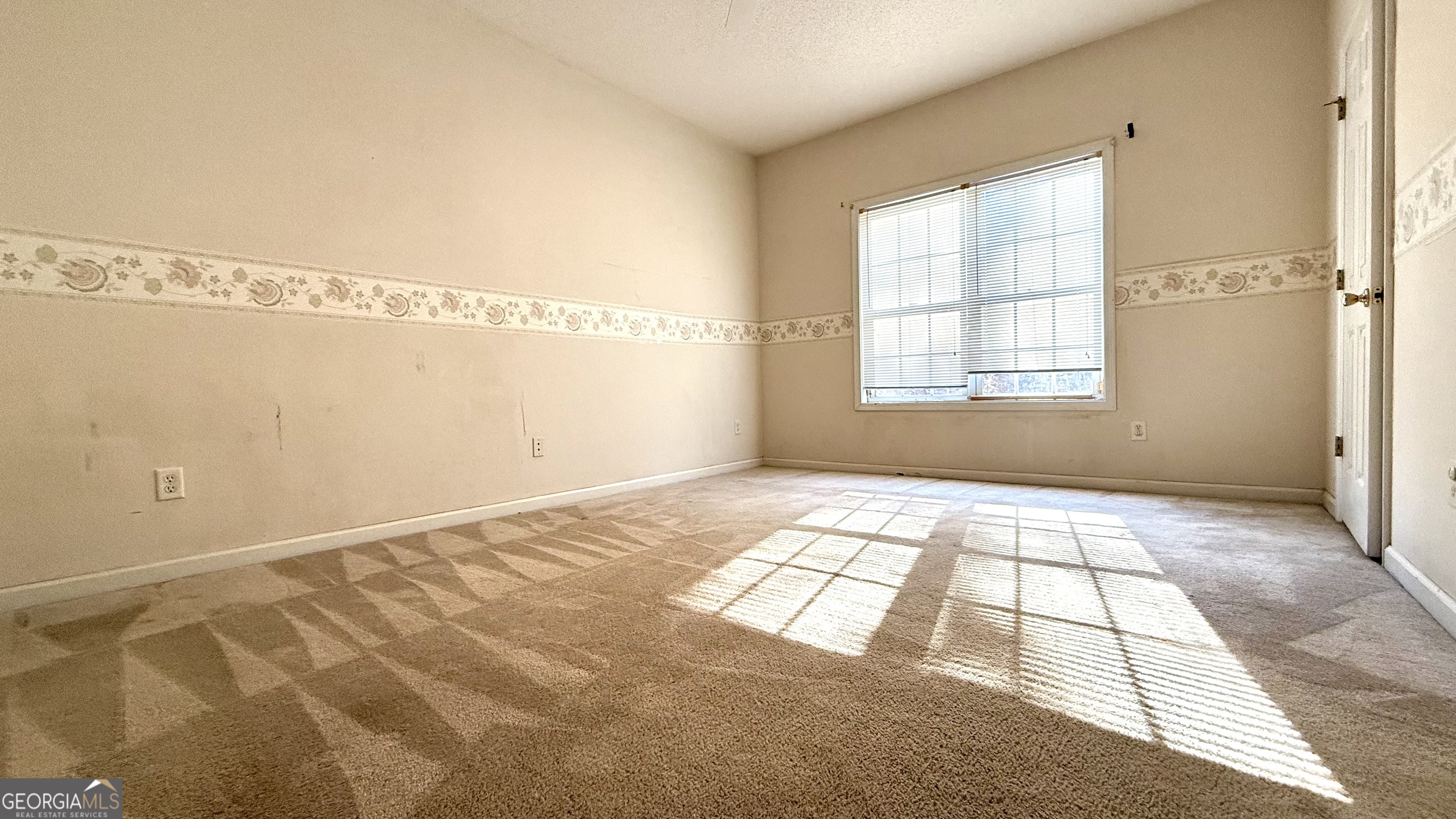 230 Mels Way Stockbridge, GA 30281 - Photo 28 of 40 a view of empty room with windows