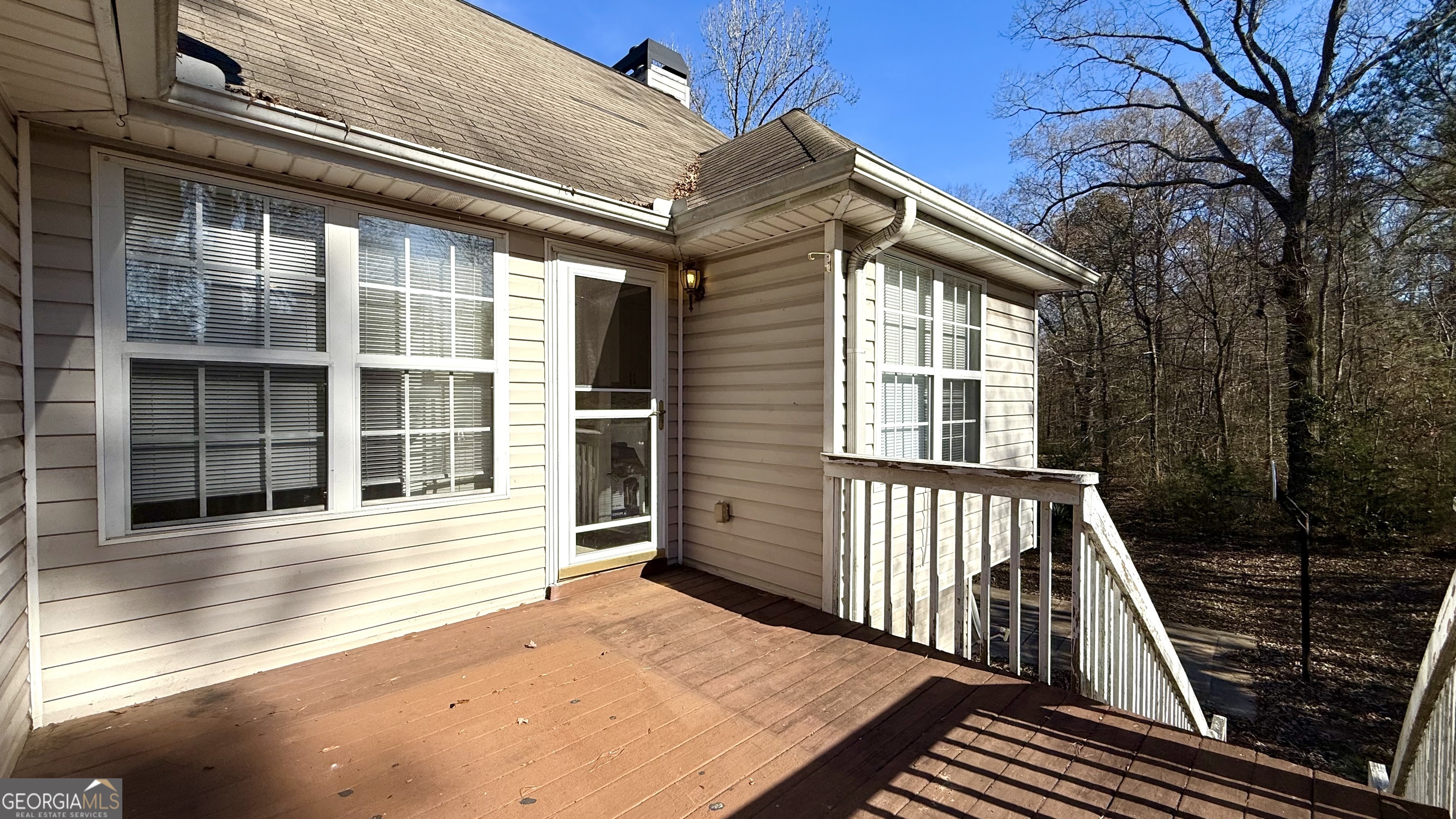 230 Mels Way Stockbridge, GA 30281 - Photo 32 of 40 a view of a house with backyard and deck