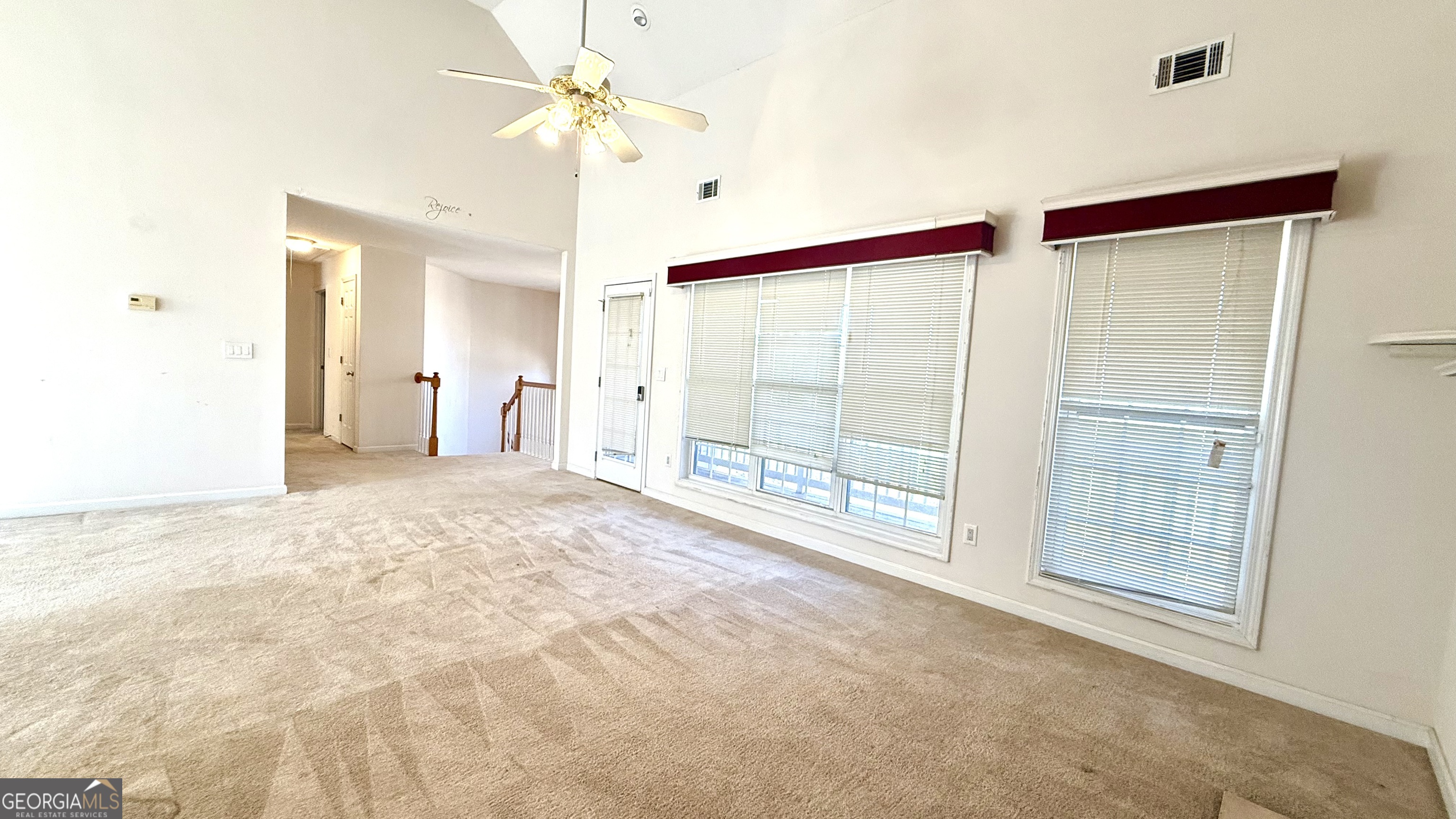 230 Mels Way Stockbridge, GA 30281 - Photo 9 of 40 a view of an empty room with a cabinet