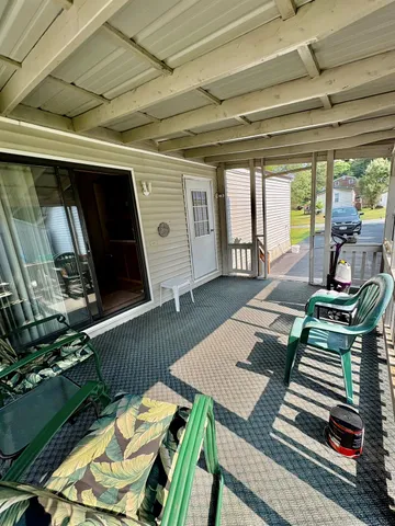 a view of a patio filled with furniture