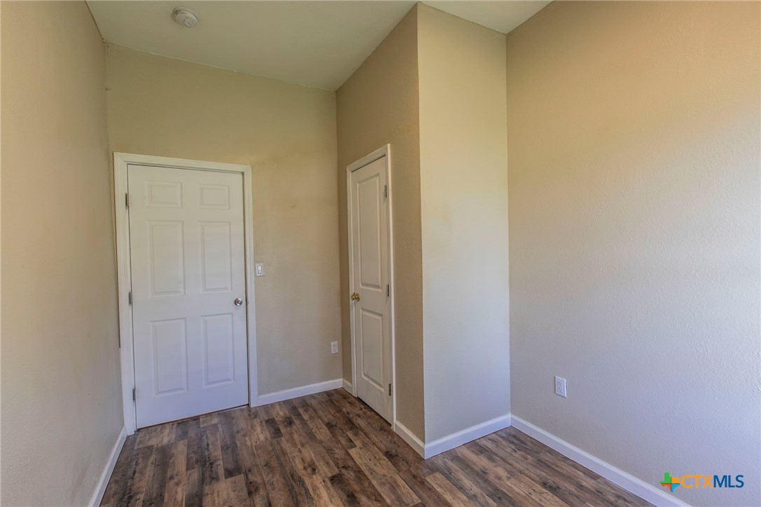 914 South 2nd Street Temple, TX 76504 - Photo 15 of 25 a view of hallway with wooden floor