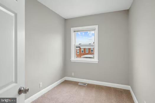 4204 Seidel Avenue Baltimore, MD 21206 - Photo 12 of 23 a view of an empty room with a window