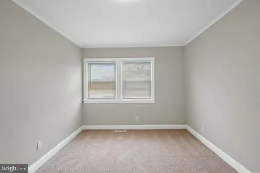 a view of a room that has a window in it