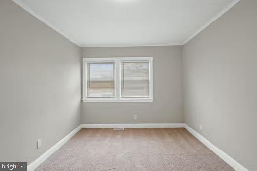 4204 Seidel Avenue Baltimore, MD 21206 - Photo 13 of 23 a view of a room that has a window in it