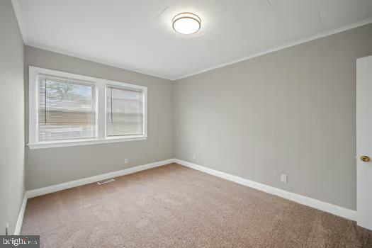4204 Seidel Avenue Baltimore, MD 21206 - Photo 16 of 23 an empty room with a window