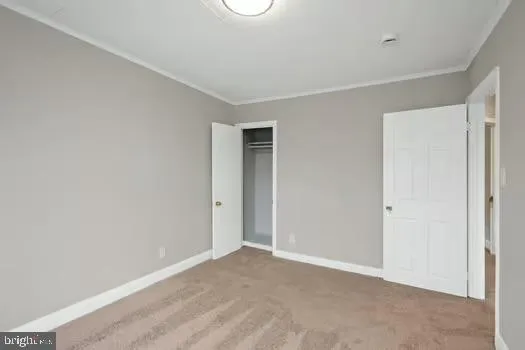 a view of a hallway with elevator