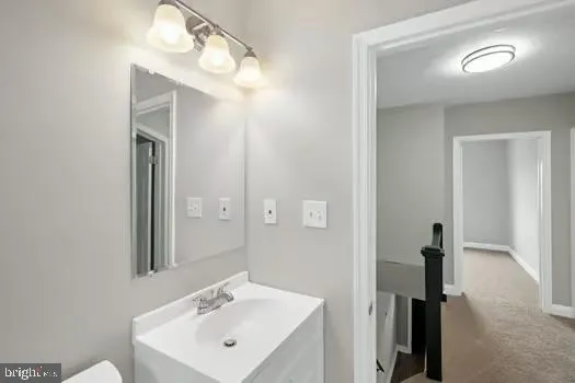 a bath tub sitting next to a window